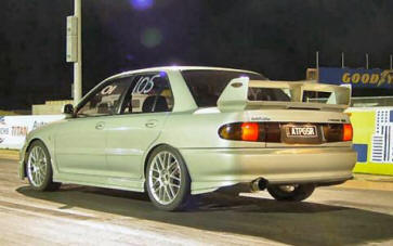 GSR - 4-door sedan. Powered by a turbocharged 1.8L engine (4G93t) DOHC